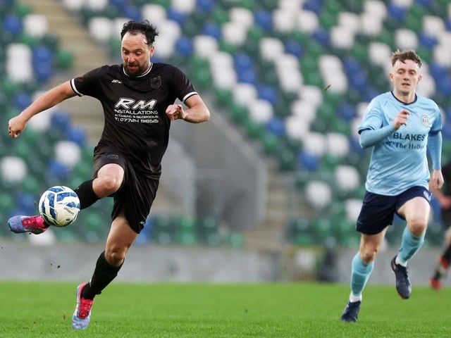Midfield action during Friday's fonaCAB Craig Stanfield Irish Junior Cup final at Windsor Park. (Photo: IFA)