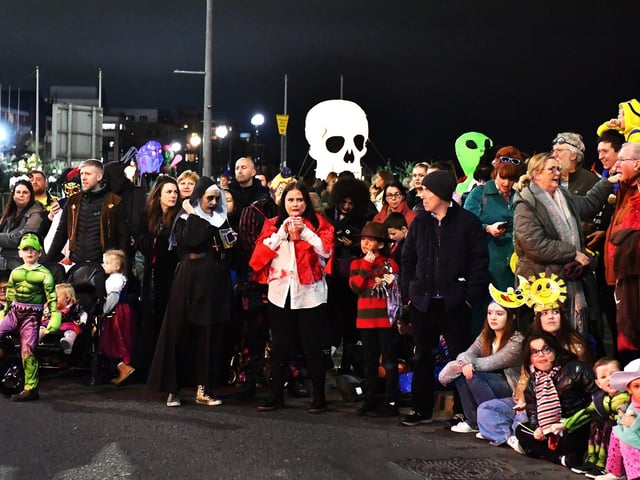 Spectators pictured at the Halloween parade. Photo: George Sweeney