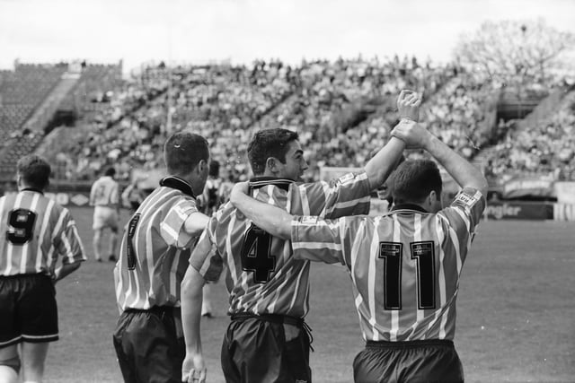 Peter Hutton is congratulated by his team-mates after slotting home in the final.