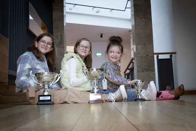 Prizewinners and sisters Aoife and Erin Mclaugh with cousin Maeve McKee.