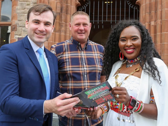 The Mayor of Derry City and Strabane District Council, Councillor Lilian Barr, welcomes Brendan Cassidy, committee member, Siamsa Sraide Street & Arts Festival Swinford, Co. Mayo, at a reception in the Guildhall. Mr. Cassidy was visiting the City as guest of the Hamilton Flute Band who have a long association with the Swinford Festival which celebrates its 40th anniversary this year. Included is Stephen Williamson, chairman, Hamilton Flute Band.