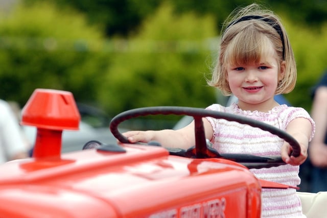 Young Lauren Harkin from Glencrow, Moville, on her uncle's 1961 Alice Chalmers tractor.