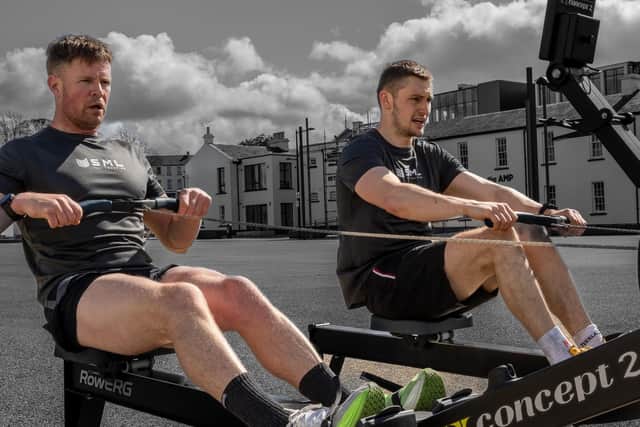 Sean McLaughlin and Sean Noble test out the rowers at Ebrington Square. Photographs by Steve Owens.
