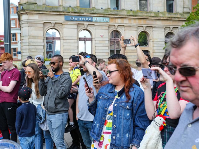 Mayor’s Supercar Saturday in aid of First Housing and Support Service.

Motor fans recording the event.

©Lorcan Doherty