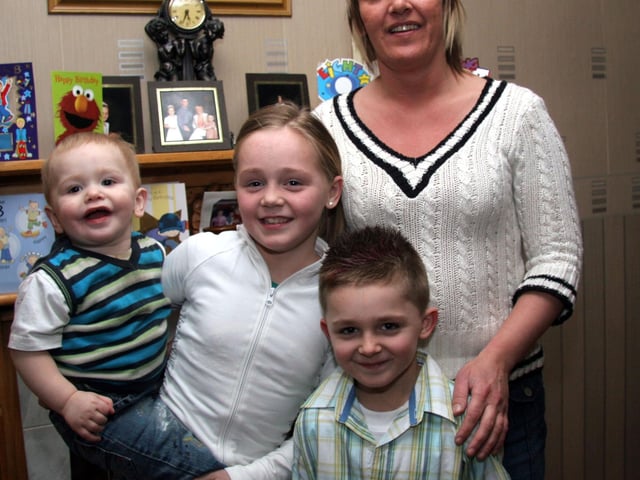 Sean pictured with his mum Christine, sister Caoimhe and little brother Conan 0012JML : Parties and nights out in March 2006