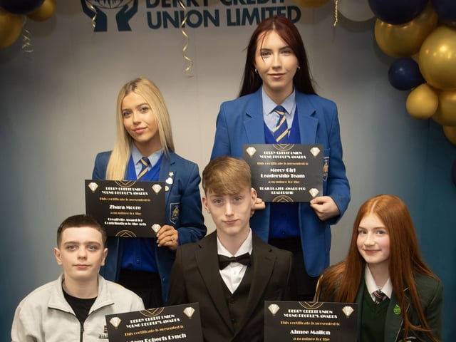 Derry Credit Union's Young People's Awards 2025 nominees being presented with their certificates by Gary McLaughlin, Youth Committee, on Monday night. At front are Adam Roberts-Lynch and Aimee Mallon. At back are Zhara Moore, and a representative of Mercy Girl Leadership Team.