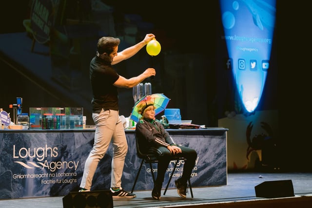 Mark the Science Guy entertaining the crowd with a volunteer