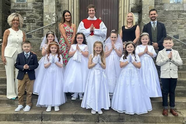 Primary 4 Class of St Patrick’s School, Gortin, Co. Tyrone, with Co-Principal Mary Grugan, Assistant Teacher Janna Marlow, Chaplain Fr Roland Colhoun, Co-Principal Caoimhe Cunningham and teacher Conor O’Hara on Saturday 25th May 2024 at St Patrick’s Church, Gortin.