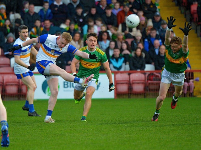 Errigal Ciaran’s Niall Kelly gets off a shot under pressure during the Ulster Senior Club Championship quarter- final game against Glen in Celtic Park on Sunday afternoon last. Photo: George Sweeney. DER2246GS – 020