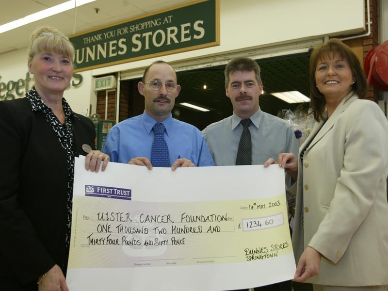 Dunnes Stores, Springtown staff members Angela Cassidy, Joe McFadden and John Curran presenting Sylvia Lucey of the Ulster Cancer Foundation with a cheque which is the proceeds of a in store raffle. (1605JB05)