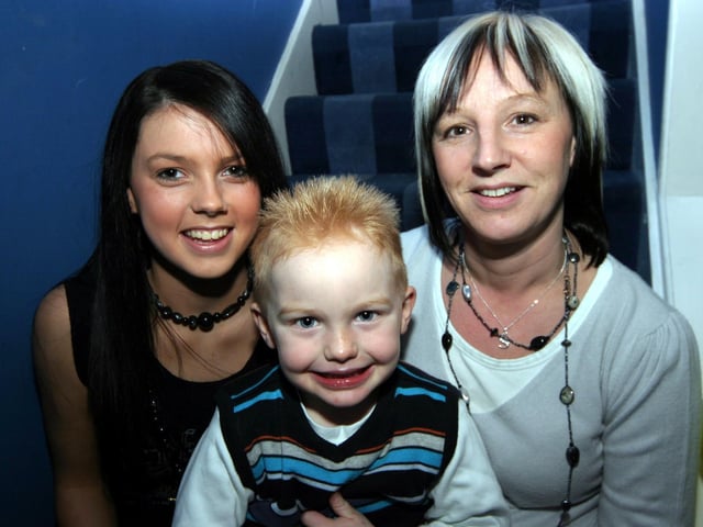 Nicole pictured with her aunt Sindy and cousin Cameron on the occasion of her 16th birthday. 0057/JML