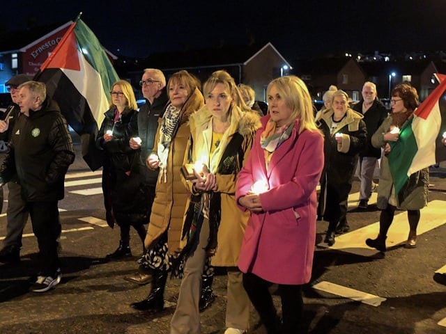 Martina Anderson and Ciara Ferguson MLA attend Thursday evening’s procession and vigil for the children of Palestine at the Bloody Sunday Monument on Rossville Street. Photo: George Sweeney
