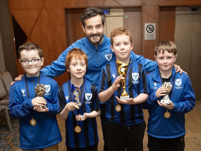 2015s Oxford United Main prizewinners pictured with coach Ryan Gallagher. From left, Hayden Gallagher, Daniel Cooley, Peter Nelson and Declan Beattie.