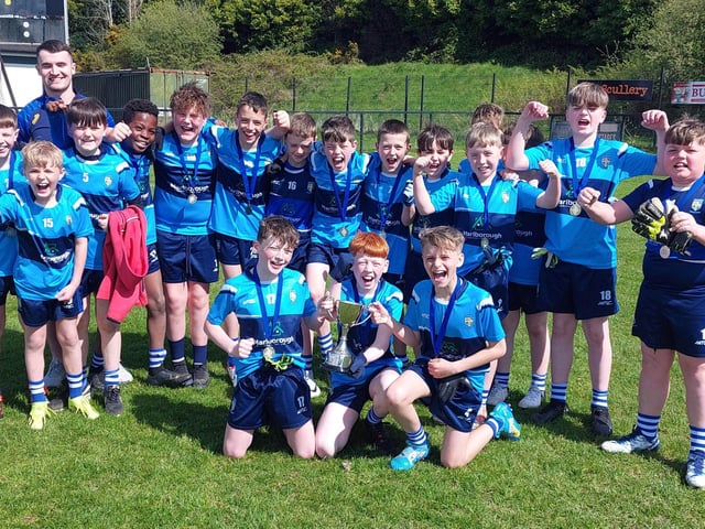 Hollybush PS, winners of the 2024 Steelstown Cup at Brian Og's pitches last week.. The team was undefeated in seven games. Included is Derry and Brian Og's player, Diarmuid Baker.