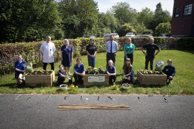 NEAR THE FINISH LINE. . . .Pupils, staff and facilitators nearing the finish line at the garden makeover in St. Mary's College. Stranding from left, Mr John Hegarty (Technology Technician), Mrs Veronica Doherty (Volunteer), Sharon McMaster (NWP), Mr Conor Lynch (Vice-Principal), Mrs Paula Molloy (Teacher of Science & Amp; Leader of Wellbeing), and Mr Kyle McMaster(NWP). Students at front from left, Eve Courtney, Ellie Armstrong, Lamise Jalloul, Clogagh Sharkey, Billie-Jo Casey, and Ellie-Mae Gallagher. (Photos: Jim McCafferty Photography)