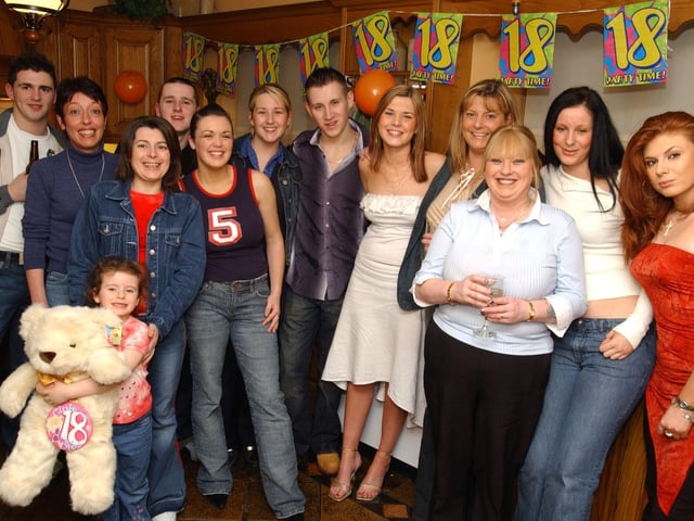 Ciara Carlin, with all her friends and family who celebrated her 18th birthday. Include are, Stephen, Mary Rose, Beano, Mary, Kelly, Kerrie, Travers, Sheila, Teresa, Mellissa, Carolanne, Shannon with the Teddy which she gave Ciara for her Birthday (0303CG01)                                      :.