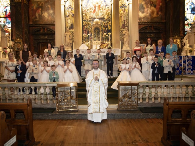 Pupils from Nazareth House Primary School who received the Sacrament of First Holy Communion from Fr. Stephen Ward at St. Columba's Church, Long Tower on Friday last. (Photo: Jim McCafferty Photography)