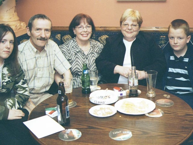 Marie, Jimmy and Emma McCourt pictured with Lucia and Christopher Marsland at the birthday party in the Argyle Arms. 290503HG9