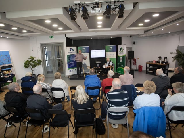 Brian Dougherty making a presentation on 'The Exodus' during Monday's Connections Peace Barrier Project "Did Ye Hear About?" at the Gasyard. : .