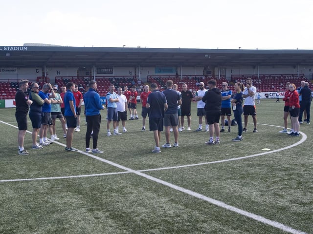 Managers, coaches and tournament organisers having a briefing before the start of Feile 2025's Annual Ryan McBride Cup at the Brandywell. (Photos: Jim McCafferty Photography)