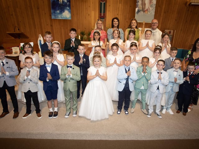 Pupils from Steelstown Primary School who received the Sacrament of First Holy Communion from Fr. McDevitt at Our Lady of Lourdes Church, Steelstown on Saturday last. (Photo: Jim McCafferty Photography)