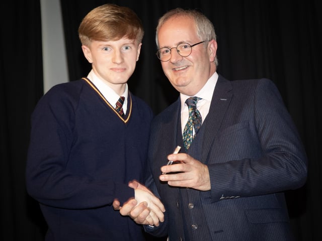 Ben Richards receiving the U16 Football Award from Mr. John Harkin, Principal.