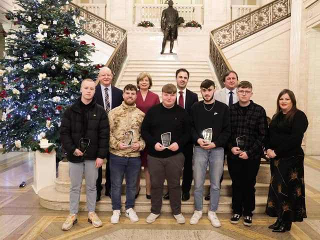 Thirty students from Northern Ireland’s Further Education Colleges have been recognised as the first recipients of a Northern Ireland Traineeship at a ceremony in Stormont. The students, five from each FE College, were among the first cohort of students from Northern Ireland to complete a NI Traineeship. Pictured from North West Regional College are (Front Row, L to R) NI Traineeship in Carpentry and Joinery award receipients: Shea Glenn, Faolan Boyd, Caemgen Kealey, Matthew Hassan, Eoin Hamilton, Louise Watson, Director of Further Education, Department for the Economy. Back Row, L to R: The new NI Traineeships enable school-leavers and adults to gain a qualification equivalent to five GCSEs (Level 2), while also gaining valuable work experience in the sector they are interested in. Gary Killeen, NUprint Technologies, Dr Catherine O'Mullan, NWRC, Clement Athanasiou, DfE and Leo Murphy, Principal and CEO, NWRC.