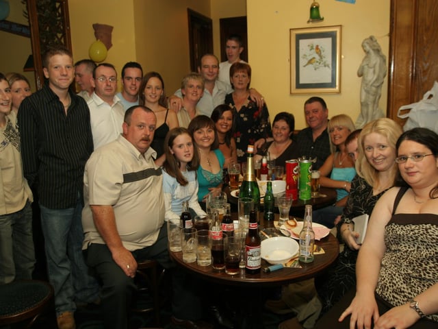 Cathy and Tony celebrate with friends and family, having a few drinks and some pub grub.
