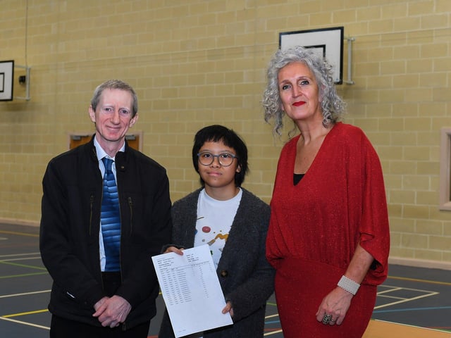 Thornhill College student Aaqilah Effirul, who achieved 4 A’s in her A Level results, pictured with maths teacher Mr McCafferty and principal Ms Mallett. Photo: George Sweeney