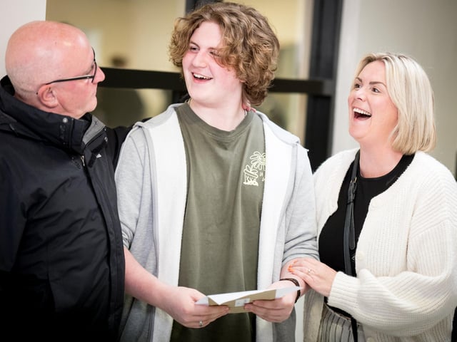Charlie McLaughlin and his parents.