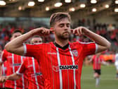 NO NONSENSE . . . Derry City’s Will Patching's celebration was a clear message to the critics after his injury time goal against Sligo Rovers at the Brandywell on Friday evening. Photo: George Sweeney. DER2327GS - 084