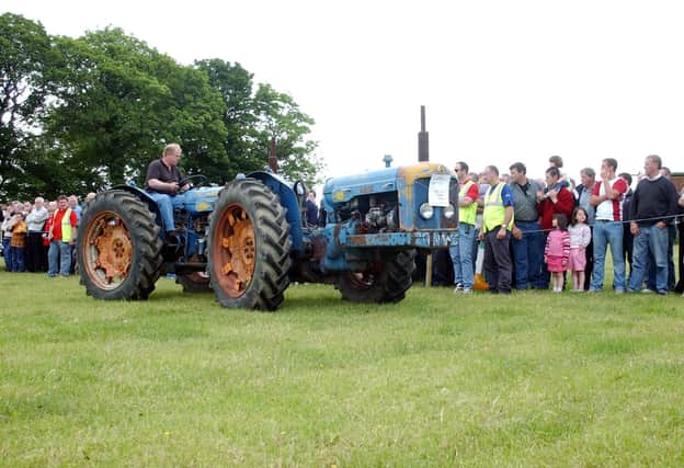 Crowds watching on at the Inishowen Vintage Agricultural Show in JUne 2003.