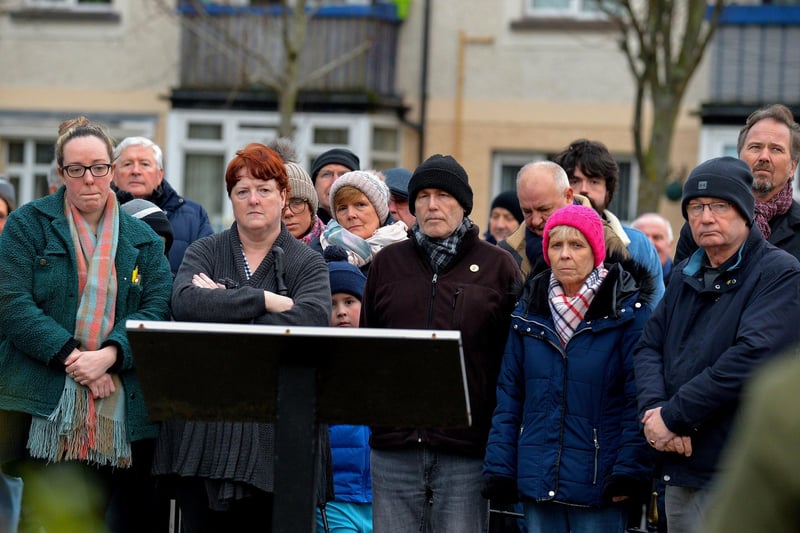 Relatives are joined by people at the Bloody Sunday monument at Joseph's Place on Monday afternoon for a one minute silence on the 51st anniversary of the Bloody Sunday massacre. Photo: George Sweeney. DER2306GS 41
