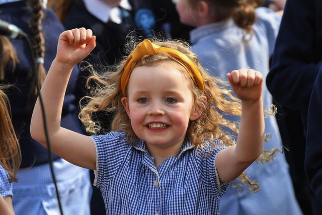 A Rosemount Primary School pupil dancing to the music and song of the Jive Aces on Thursday morning. Photo: George Sweeney