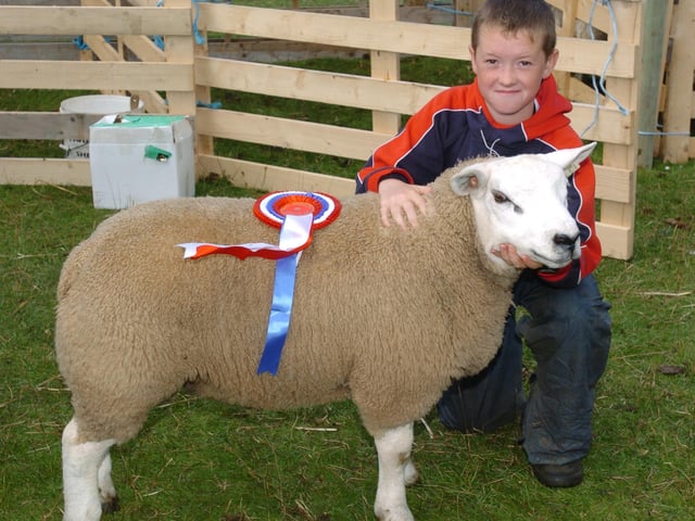 Ryan Greene,  pictured with his winning champion texel Ram Lamb and Overall champion sponsored by George Doherty Construction. (0508A17) : Clonmany Festival, Vintage Show, Agricultural Show and Raft Race in August 2005.