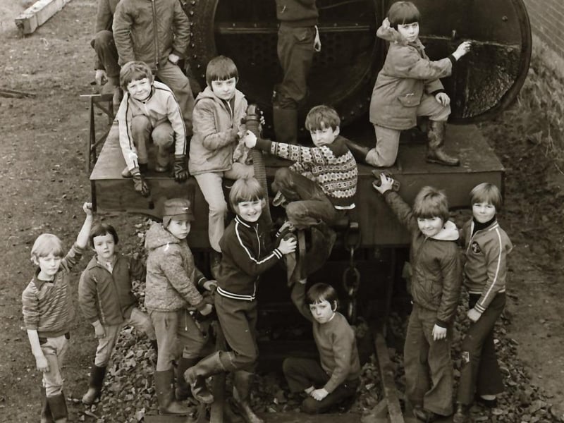 Newbuildings Cub Scouts lending a hand to clean up the train at Foyle Valley Railway Station.