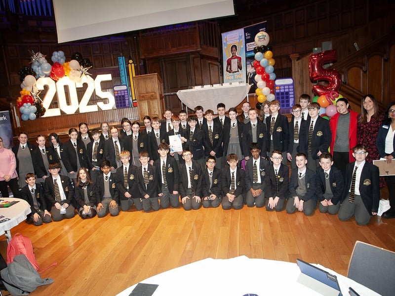 NI Maths Fest event organiser Dr. Sumeeta Gupta pictured with students from Lumen Christi and their teachers at Friday's event in the Guildhall. : .