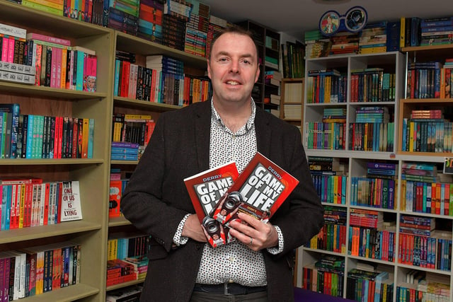 Journalist Michael McMullan pictured at signing event for his new Derry GAA Book ‘Game of my Life’ at Little Acorns Book Store on Saturday morning. The book features 25 of Derry’s greatest gaelic footballers. Photo: George Sweeney