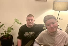 Evan McMenamin (left) with his brother, Travis (right).