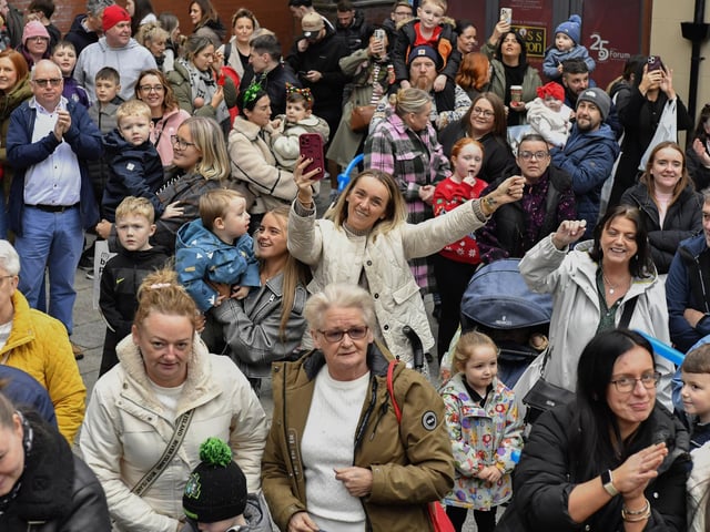 Families await the arrival of Santa at the Richmond Shopping Centre on Sunday afternoon. Photo: George Sweeney