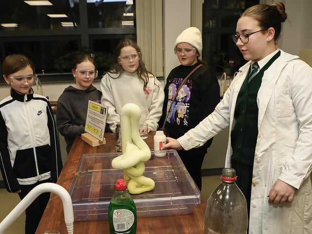 Student Kyra McGilloway with P7 pupils in the Science Department at St. Cecilia’s College Open Night. (Photo - Tom Heaney, nwpresspics)