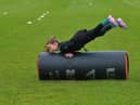Young participant develops her tackling skills at the recent City of Derry Youth Rugby Summer Camp.  Photo: George Sweeney. DER2331GS – 53