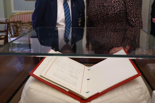 Erin and her mum in Hillsborough with the Good Friday Agreement
