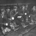 Tunnel workers taking a break from their work on one of the hydro-electric schemes in Scotland in the mid-twentieth century.
(Image courtesy of SSE Renewables).