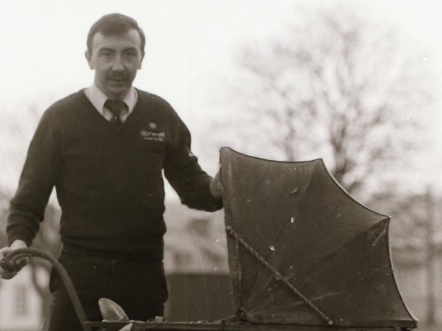 Ronnie Wilson with an antique pram.