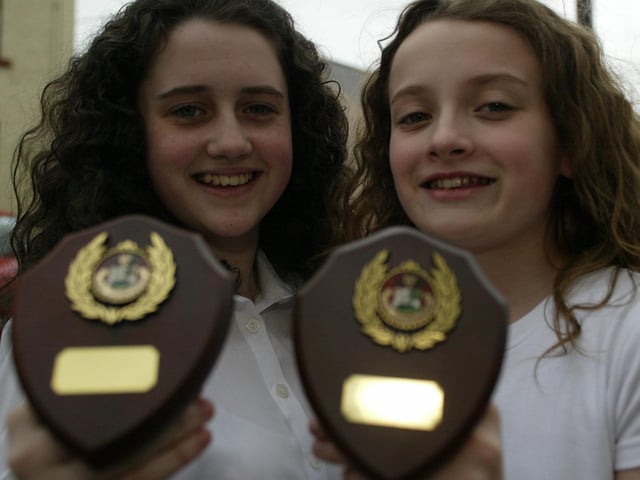 Cousins Rebecca O'Doherty and Ava McGeehan winners of the piano duets under 12 at Movile Feis. The girls are students of McGinley School of Music. (0405JB67):Winners at the Moville Feis in 2004.:Moville Feis 2004