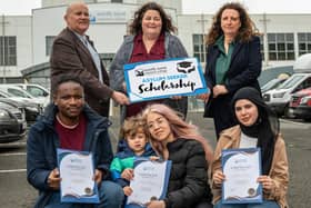 Paul Sceeny, North West Migrants Forum, Bronagh Fikri, International Projects Officer, Gillian Moss, Head of Client Services at NWRC, Micheal Mutebi, Diana Tamayo and son Liam, and Ghadeer Fatouh. Photo: Martin McKeown.