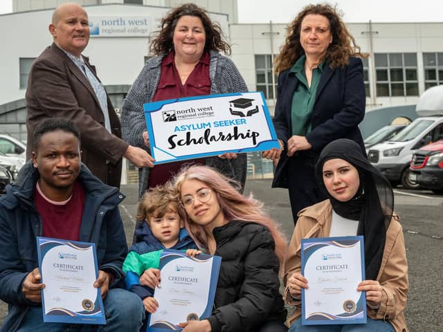 Paul Sceeny, North West Migrants Forum, Bronagh Fikri, International Projects Officer, Gillian Moss, Head of Client Services at NWRC, Micheal Mutebi, Diana Tamayo and son Liam, and Ghadeer Fatouh. Photo: Martin McKeown.