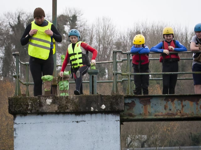 One of the brave St. Joseph’s Boys School staff members makes the plunge.