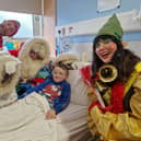 Santa and his helpers visiting the Children's Ward in Altnagelvin Hospital.